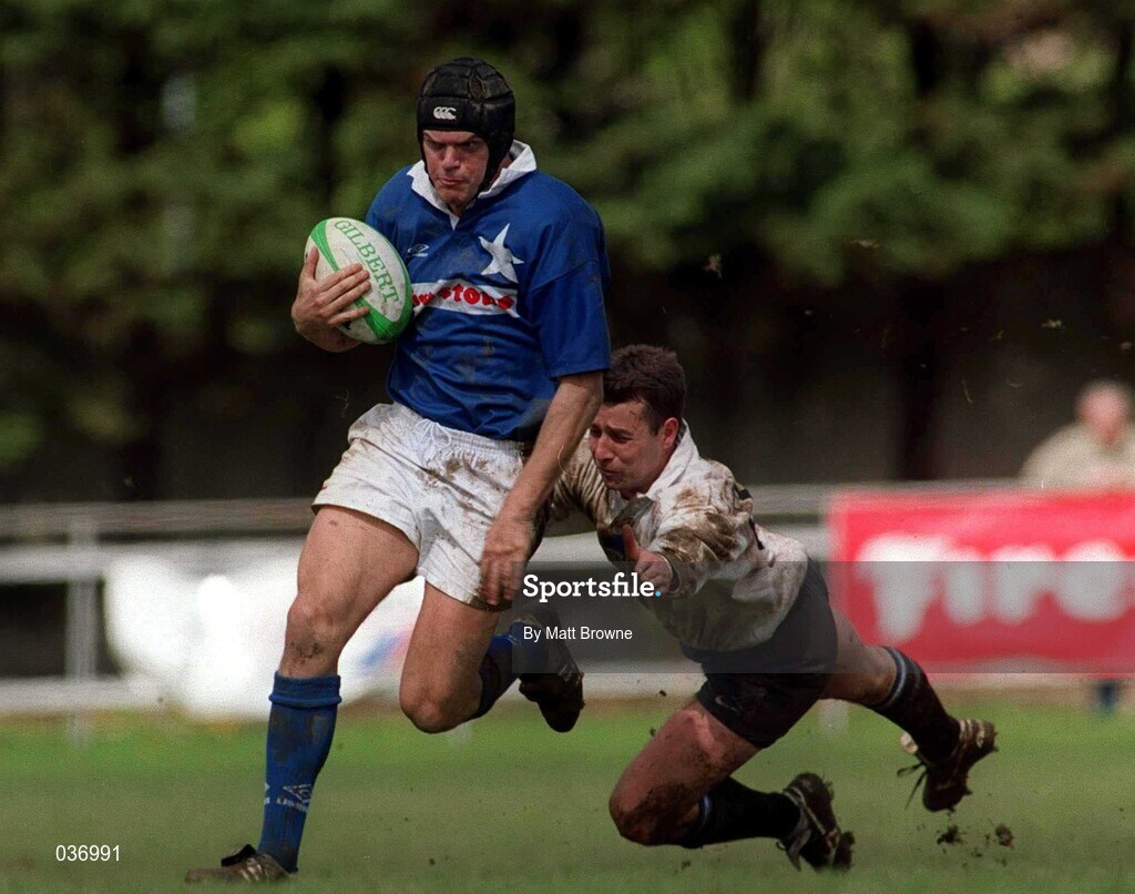29 April 2000; John McWeeney of St Mary's is tackled by Brian Walsh of Cork Constitution during the AIB All-Ireland League Division 1 match between St Mary's and Cork Constitution at Templeville Road in Dublin. Photo by Matt Browne/Sportsfile
