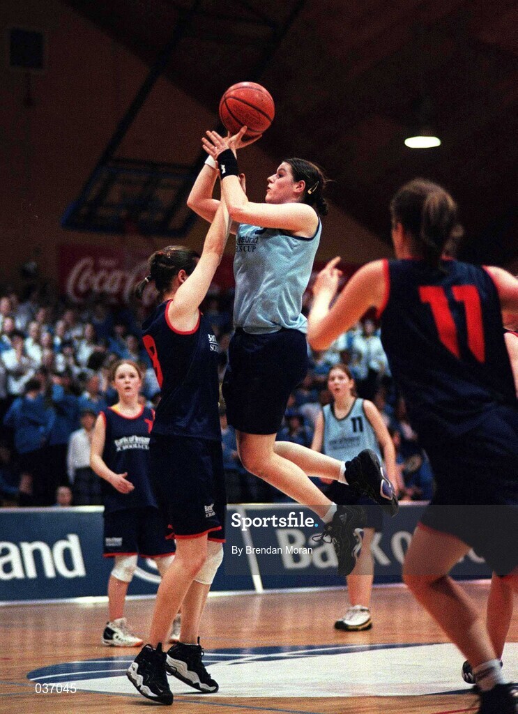 8 February 2000; Kate Maher of Mercy Waterford shoots a basket under pressure from Caitriona O'Connell of  Presentation Killarney during the Bank of Ireland Schools Cup Girls' A Final match between Mercy Waterford and Presentation Killarney at National Basketball Arena in Tallaght, Dublin. Photo by Brendan Moran/Sportsfile