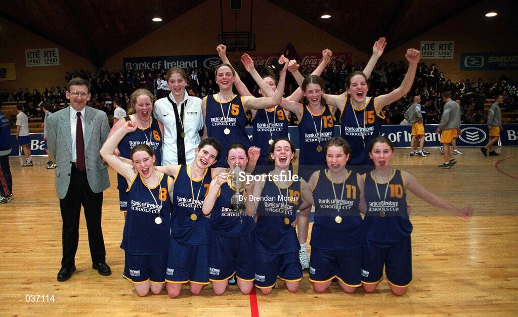 8 February 2000; The Scoil Ruain Killenaule team celebrate with the trophy following the Bank of Ireland Schools Cup Girls' B Final match between Scoil Ruain Killenaule and Loreto Foxrock at National Basketball Arena in Tallaght, Dublin. Photo by Brendan Moran/Sportsfile