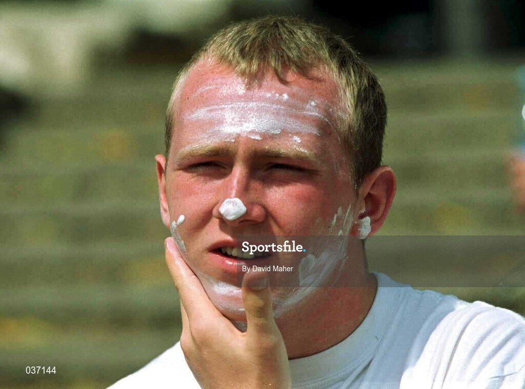 30 April 2000; Leonard Walker applies sun cream during a Republic of Ireland U16's training session at Kefar Silver Youth Village in Ashkelon, Israel. Photo by David Maher/Sportsfile