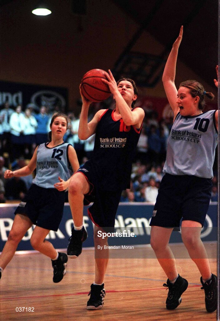 8 February 2000; Mairead Finnegan of Presentation Killarney in action against Jenny Coady, right, and Jennifer Kelly of Mercy Waterford during the Bank of Ireland Schools Cup Girls' A Final match between Mercy Waterford and Presentation Killarney at National Basketball Arena in Tallaght, Dublin. Photo by Brendan Moran/Sportsfile
