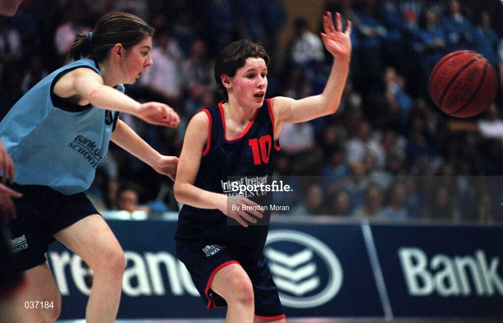 8 February 2000; Mairead Finnegan of Presentation Killarney in action against Jenny Coady of Mercy Waterford during the Bank of Ireland Schools Cup Girls' A Final match between Mercy Waterford and Presentation Killarney at National Basketball Arena in Tallaght, Dublin. Photo by Brendan Moran/Sportsfile