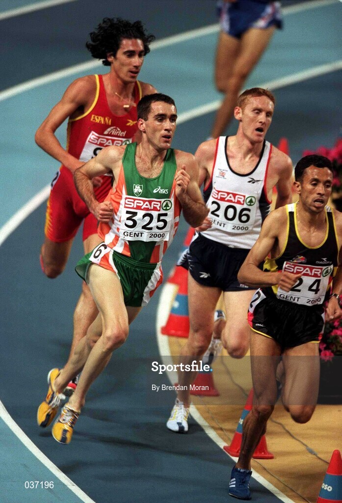 25 February 2000; Mark Carroll of Ireland and John Mayock of Great Britain compete in the Men's 3000m heat on Day One of the European Athletics Indoor Championships at Flanders Sports Arena in Ghent, Belgium. Photo by Brendan Moran/Sportsfile