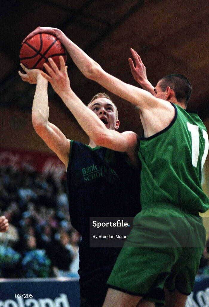 9 February 2000; Mark McEvoy fo Carrick-On-Shannon CS in action against Christopher O'Sullivan of Colaiste Mhuire Crosshaven during the Bank of Ireland Schools Cup Boys' C Final match between Colaiste Mhuire Crosshaven and Carrick-On-Shannon CS at National Basketball Arena in Tallaght, Dublin. Photo by Brendan Moran/Sportsfile