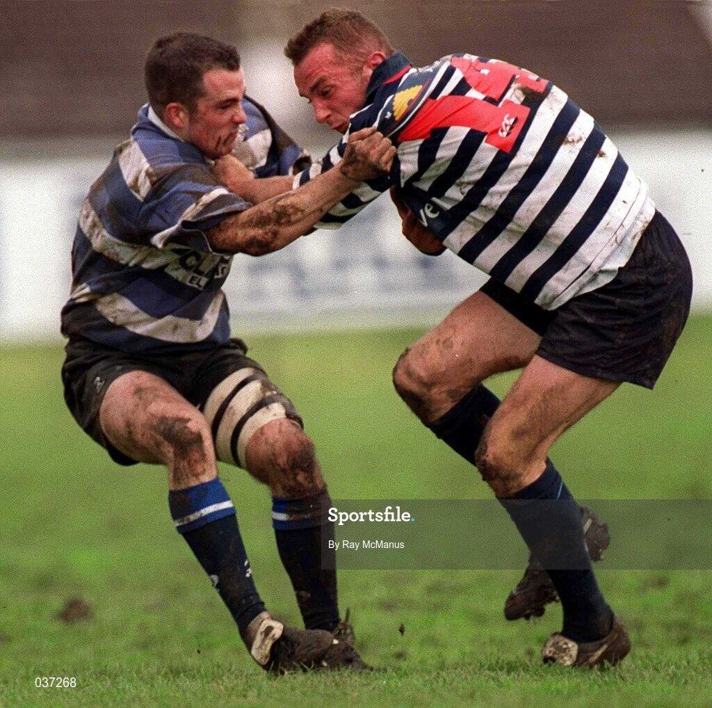 29 April 2000; Michael Price of Blackrock College is tackled by Billy Leahy of Old Crescent during the AIB All-Ireland League Division 2 match between Blackrock College and Old Crescent at Stradbrook Road in Dublin. Photo by Ray McManus/Sportsfile