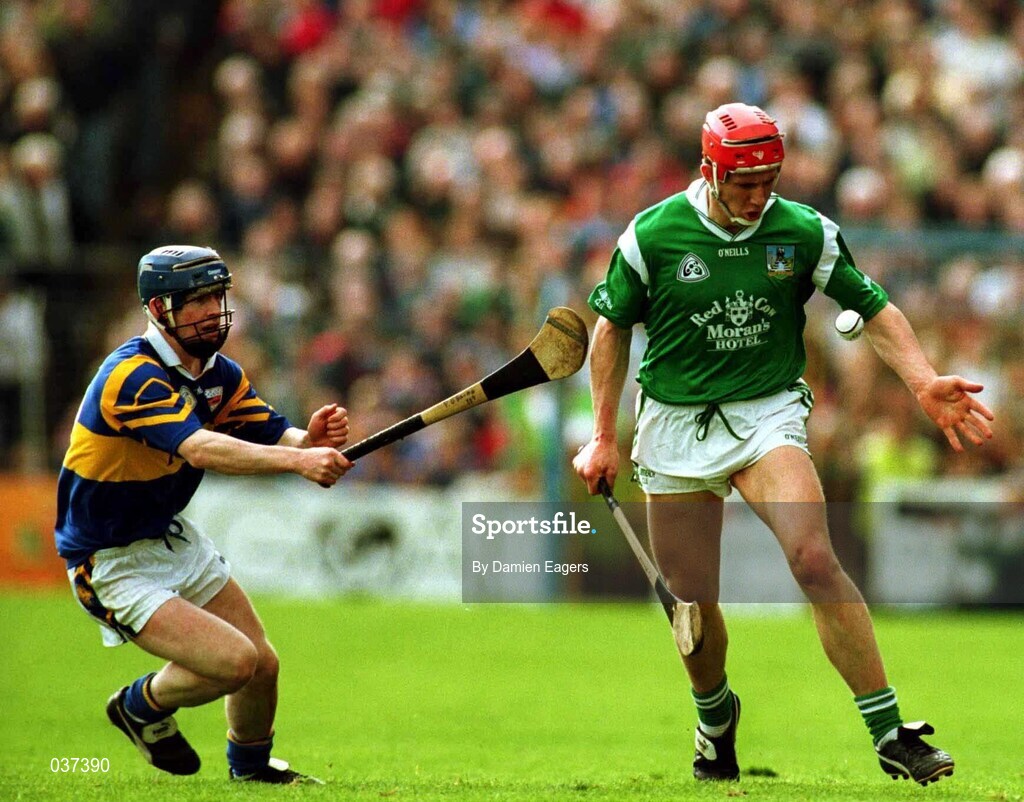 30 April 2000; Ollie Moran of Limerick in action against Mark O'Leary of Tipperary during the Church & General National Hurling League Division 1 Semi-Final match between Tipperary and Limerick at Semple Stadium in Thurles, Tipperary. Photo by Damien Eagers/Sportsfile