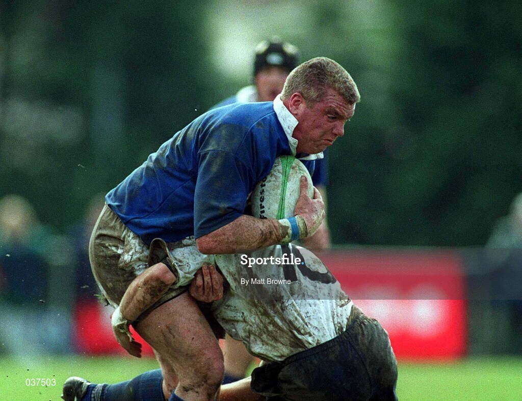 29 April 2000; Victor Costello of St Mary's is tackled by Ronan O'Gara of Cork Constitution during the AIB All-Ireland League Division 1 match between St Mary's and Cork Constitution at Templeville Road in Dublin. Photo by Matt Browne/Sportsfile