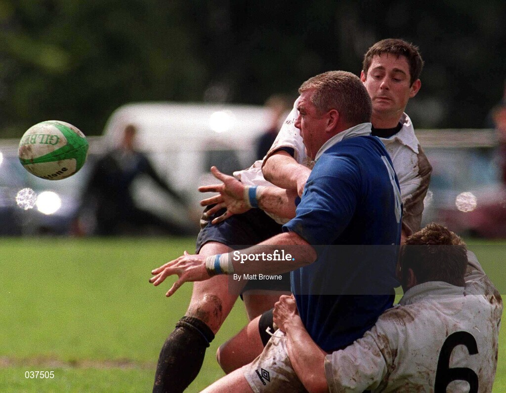 29 April 2000; Victor Costello of St Mary's is tackled by Brian O' Meara and Donnacha O' Callaghan of Cork Constitution during the AIB All-Ireland League Division 1 match between St Mary's and Cork Constitution at Templeville Road in Dublin. Photo by Matt Browne/Sportsfile