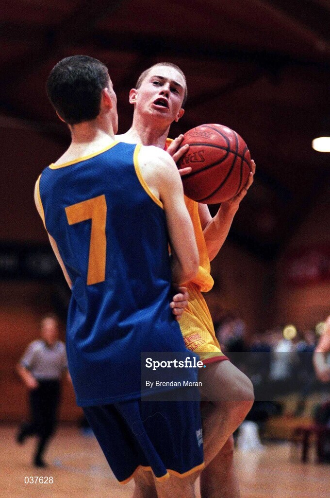 8 February 2000; Sean Carroll of  St Mary's Moyderwel in action against Eddie Kelly of St Laurence Loughlinstown during the Bank of Ireland Schools Cup Boys' B Final match between St Laurence Loughlinstown and St Mary's Moyderwel at National Basketball Arena in Tallaght, Dublin. Photo by Brendan Moran/Sportsfile