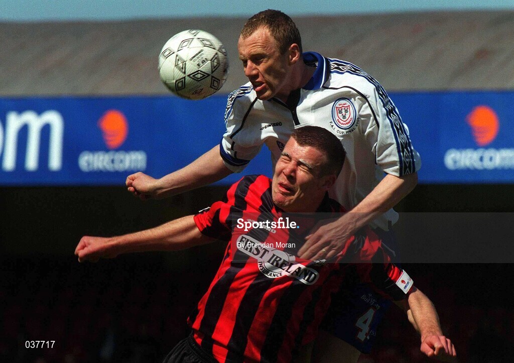 30 April 2000; Stephen Caffrey of Bohemians in action against  Tony McCarthy of Shelbourne during the FAI Cup Final match between Shelbourne and Bohemians at Tolka Park in Dublin. Photo by Brendan Moran/Sportsfile