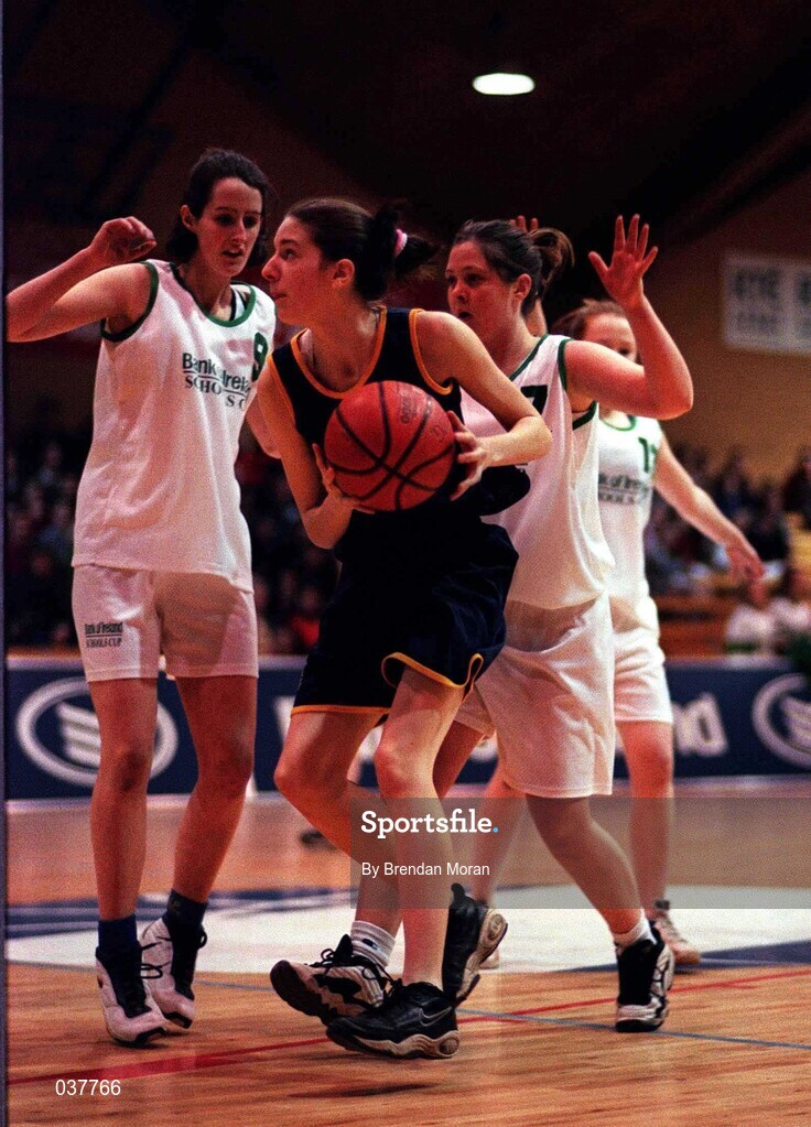 8 February 2000; Teresa Cleary of Scoil Ruain Killenaule in action against Siobhan Cullen of Loreto Foxrock during the Bank of Ireland Schools Cup Girls' B Final match between Scoil Ruain Killenaule and Loreto Foxrock at National Basketball Arena in Tallaght, Dublin. Photo by Brendan Moran/Sportsfile