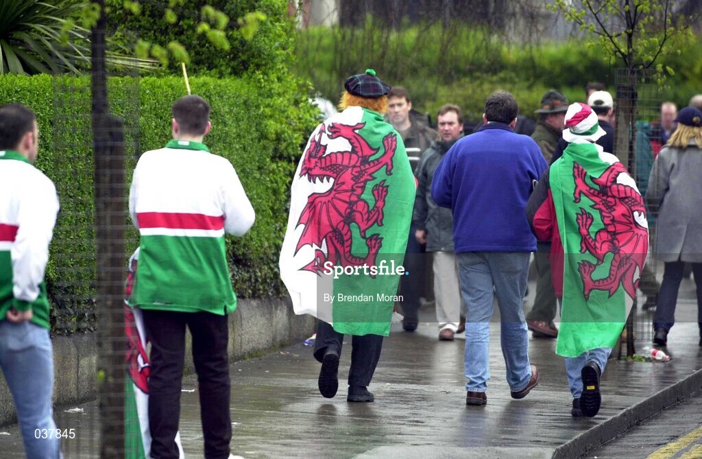 1 April 2000; Wales supporters make their way to the stadium prior to the Lloyds TSB 6 Nations match between Ireland and Wales at Lansdowne Road in Dublin. Photo by Brendan Moran/Sportsfile