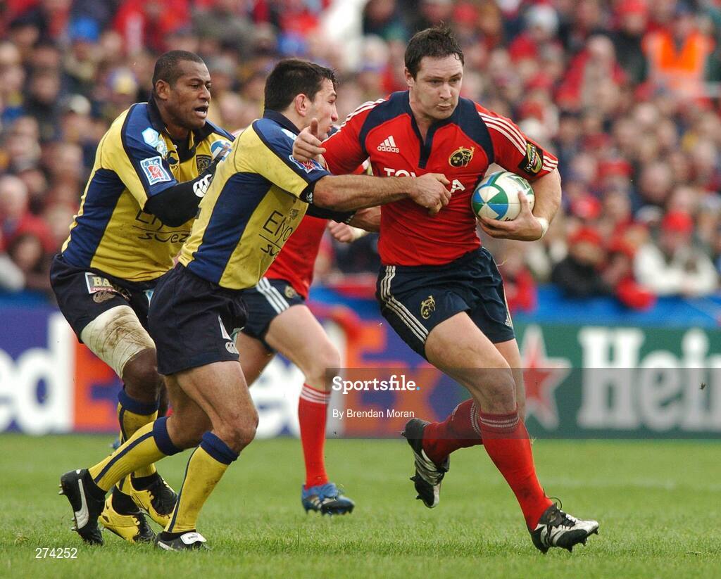 18 November 2007; David Wallace, Munster, is tackled by Seremaia Beikeinuku, left, and Raphael Chanal, Clermont Auvergne. Heineken Cup, Pool 5, Round 2, Munster v Clermont Auvergne, Thomond Park, Limerick. Picture credit; Brendan Moran / SPORTSFILE *** Local Caption ***