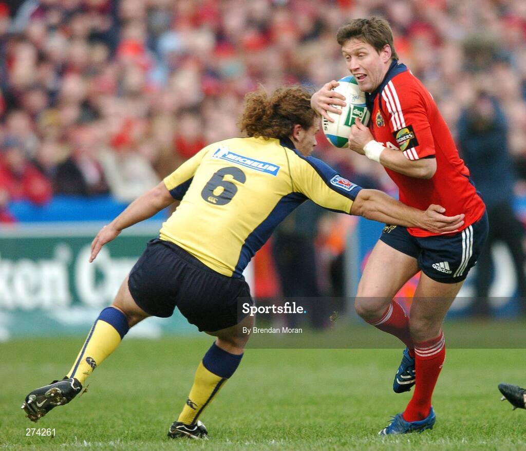 18 November 2007; Ronan O'Gara, Munster, is tackled by Fabien Alexandre, Clermont Auvergne. Heineken Cup, Pool 5, Round 2, Munster v Clermont Auvergne, Thomond Park, Limerick. Picture credit; Brendan Moran / SPORTSFILE *** Local Caption ***