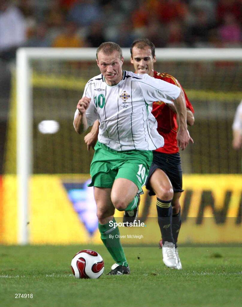 21 November 2007; Warren Feeney, Northern Ireland, in action against Daniel Guiza, Spain. 2008 European Championship Qualifier, Spain v Northern Ireland, Estadio de Gran Canaria, Las Palmas, Spain. Picture credit; Oliver McVeigh / SPORTSFILE