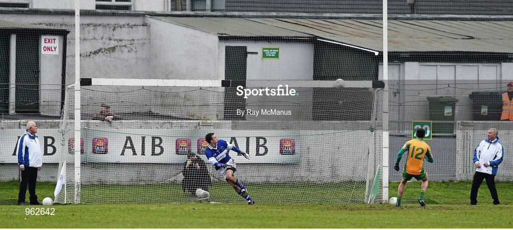 14 February 2015; St. Vincent's goalkeeper Michael Savage dives the wrong way as a penalty shot from Gary Delaney, Corofin, hits the crossbar. AIB GAA Football All-Ireland Senior Club Championship, Semi-Final, Corofin v St Vincent's. O'Connor Park, Tullamore, Co. Offaly. PIcture credit: Ray McManus / SPORTSFILE