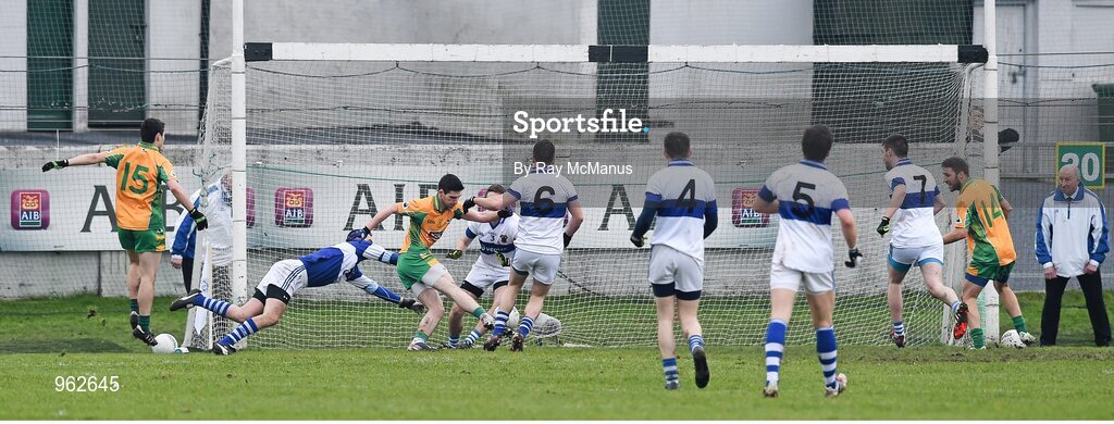 14 February 2015; Martin Farragher shoots past St Vincent's goalkeeper Michael Savage and full back Jarlath Curley to score a goal for Corofin late in the first half. AIB GAA Football All-Ireland Senior Club Championship, Semi-Final, Corofin v St Vincent's. O'Connor Park, Tullamore, Co. Offaly. Picture credit: Ray McManus / SPORTSFILE