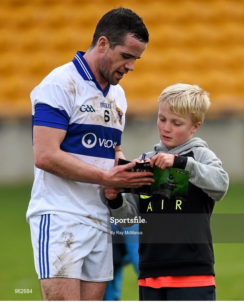 14 February 2015; The defeated Corofin captain Ger Brennan takes time out to sign an autograph after the match. AIB GAA Football All-Ireland Senior Club Championship, Semi-Final, Corofin v St Vincent's. O'Connor Park, Tullamore, Co. Offaly.