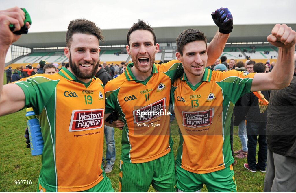 14 February 2015; Corofin's Conor Cunningham, Michael Farragher and his brother Martin Farragher celebrate at the final whistle. AIB GAA Football All-Ireland Senior Club Championship, Semi-Final, Corofin v St Vincent's. O'Connor Park, Tullamore, Co. Offaly. Picture credit: Ray Ryan / SPORTSFILE