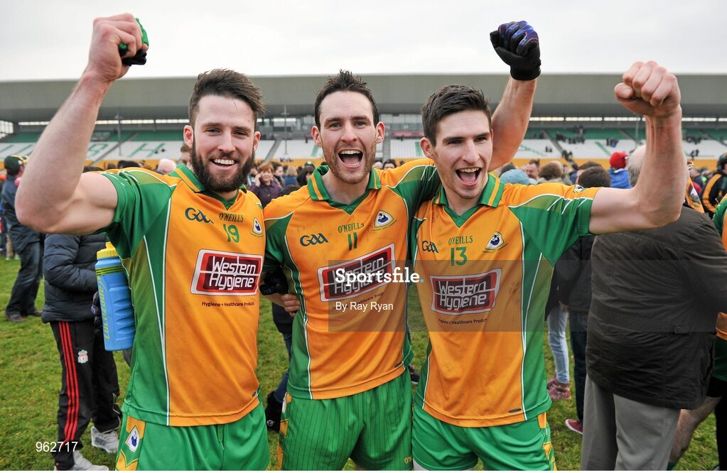 14 February 2015; Corofin's Conor Cunningham, Michael Farragher and his brother Martin Farragher celebrate at the final whistle. AIB GAA Football All-Ireland Senior Club Championship, Semi-Final, Corofin v St Vincent's. O'Connor Park, Tullamore, Co. Offaly. Picture credit: Ray Ryan / SPORTSFILE