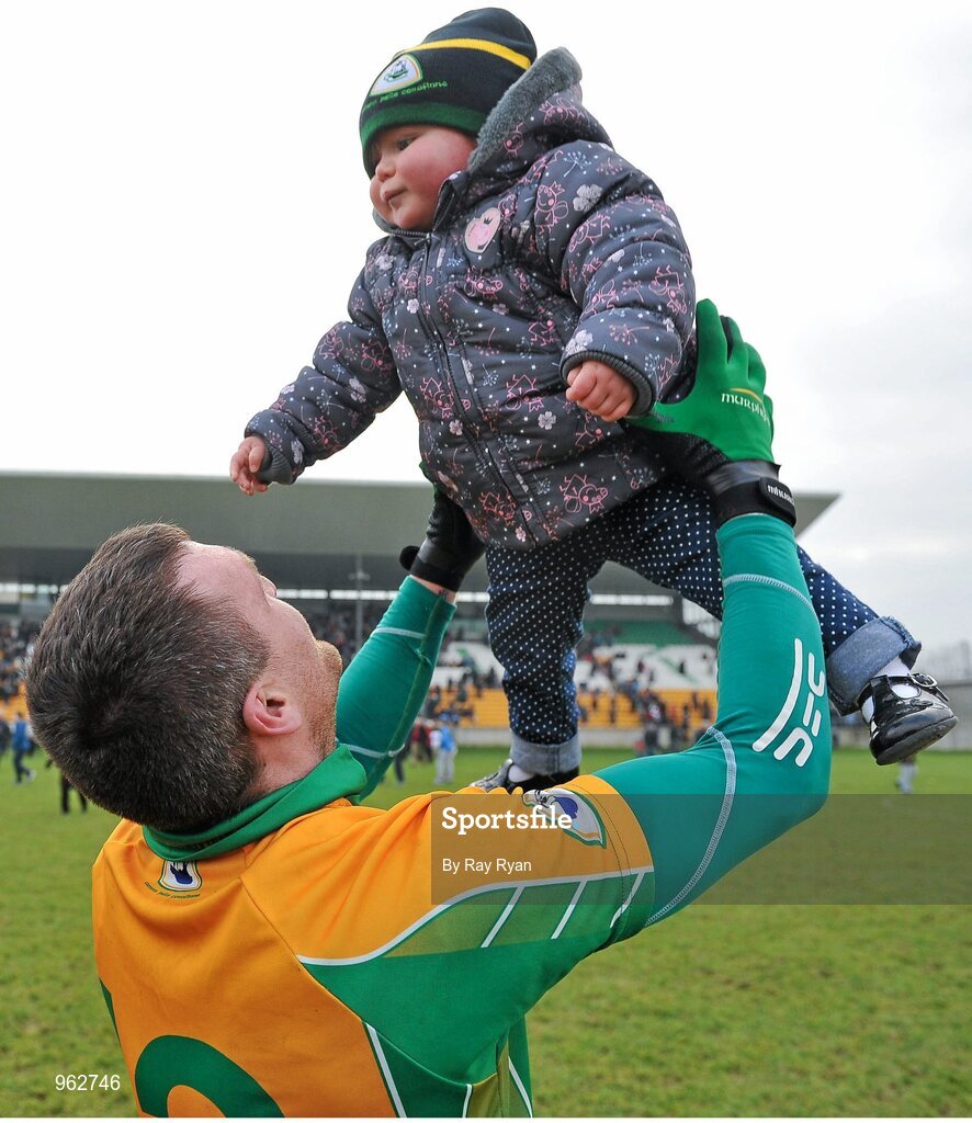 14 February 2015; Corofin's Gary Delaney holds his daughter Kaya aloft after the match. AIB GAA Football All-Ireland Senior Club Championship, Semi-Final, Corofin v St Vincent's. O'Connor Park, Tullamore, Co. Offaly. Picture credit: Ray Ryan / SPORTSFILE