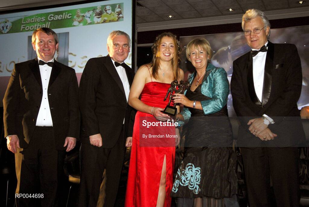 17 November 2007; Rena Buckley, Cork, is presented with her Allstar award by Geraldine Giles, President, Cumann Peil na mBan, in the company of An Taoiseach Bertie Ahern, T.D, Pol O Callachoir, left, Ceannsai, TG4 and Tony Towell, O'Neills, at the 2007 O'Neills/TG4 Ladies Football All-Star Awards. Citywest Hotel, Conference, Leisure & Golf Resort, Saggart, Co. Dublin. Picture credit: Brendan Moran / SPORTSFILE  *** Local Caption ***