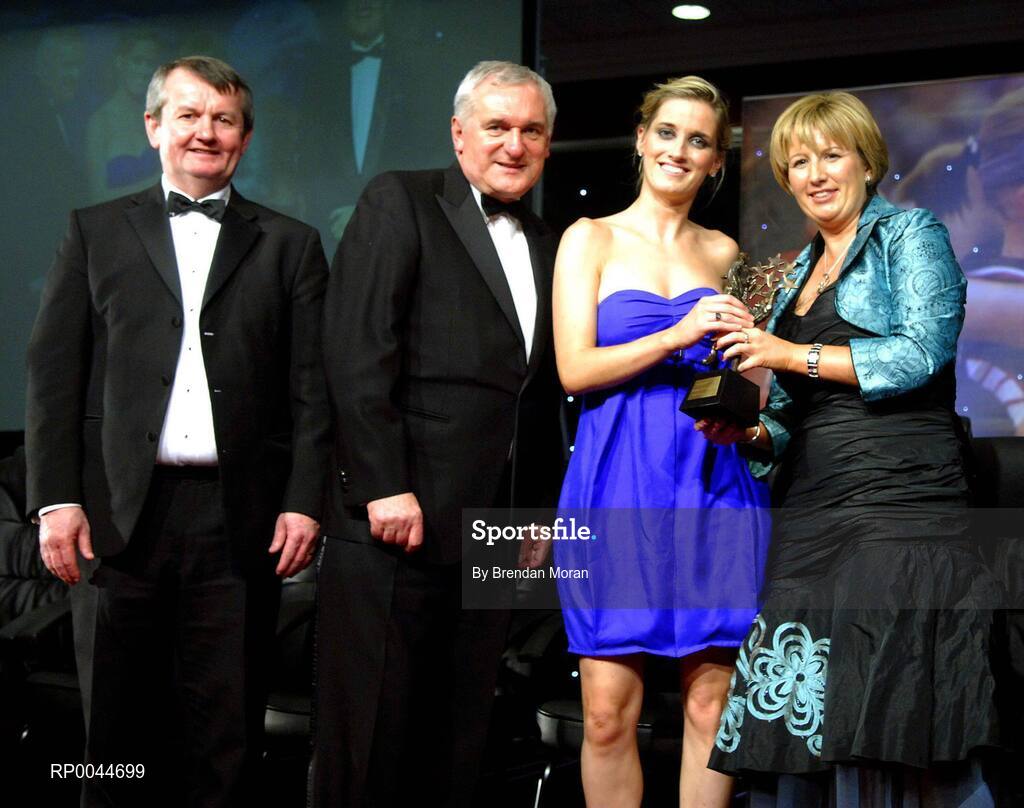 17 November 2007; Clare O'Hara, Mayo, is presented with her Allstar award by Geraldine Giles, President, Cumann Peil na mBan, in the company of An Taoiseach Bertie Ahern, T.D, Pol O Callachoir, left, Ceannsai, TG4, at the 2007 O'Neills/TG4 Ladies Football All-Star Awards. Citywest Hotel, Conference, Leisure & Golf Resort, Saggart, Co. Dublin. Picture credit: Brendan Moran / SPORTSFILE  *** Local Caption ***