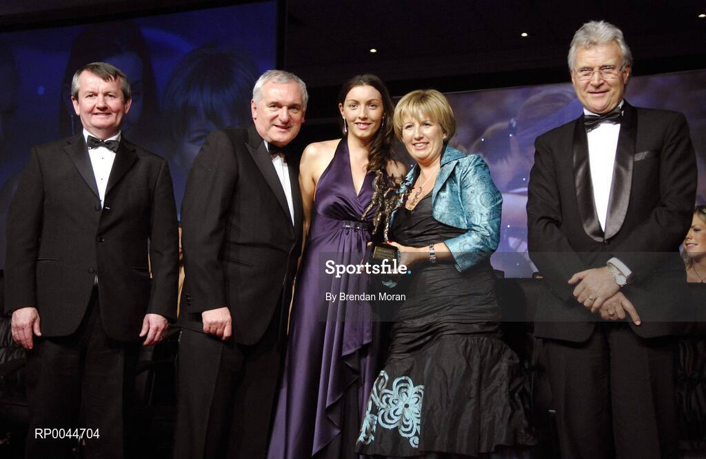 17 November 2007; Sarah McLoughlin, Leitrim, is presented with her Allstar award by Geraldine Giles, President, Cumann Peil na mBan, in the company of An Taoiseach Bertie Ahern, T.D, Pol O Callachoir, left, Ceannsai, TG4 and Tony Towell, O'Neills, at the 2007 O'Neills/TG4 Ladies Football All-Star Awards. Citywest Hotel, Conference, Leisure & Golf Resort, Saggart, Co. Dublin. Picture credit: Brendan Moran / SPORTSFILE  *** Local Caption ***
