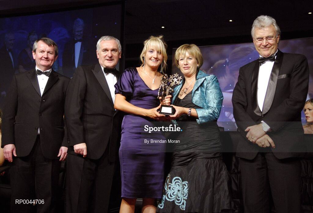 17 November 2007; Tracey Lawlor, Laois, is presented with her Allstar award by Geraldine Giles, President, Cumann Peil na mBan, in the company of An Taoiseach Bertie Ahern, T.D, Pol O Callachoir, left, Ceannsai, TG4 and Tony Towell, O'Neills, at the 2007 O'Neills/TG4 Ladies Football All-Star Awards. Citywest Hotel, Conference, Leisure & Golf Resort, Saggart, Co. Dublin. Picture credit: Brendan Moran / SPORTSFILE  *** Local Caption ***