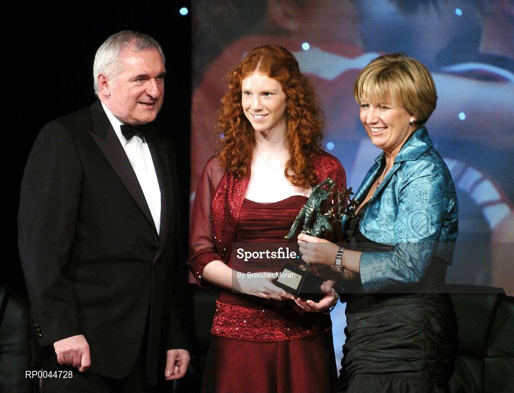 17 November 2007; Louise Ni Mhuirearchtaigh, Kerry, is presented with her Munster Player of the Year by An Taoiseach Bertie Ahern T.D. in the company of Geraldine Giles, President, Cumann Peil na mBan, at the 2007 O'Neills/TG4 Ladies Gaelic Football All-Star Awards. Citywest Hotel, Conference, Leisure & Golf Resort, Saggart, Co. Dublin. Picture credit: Brendan Moran / SPORTSFILE  *** Local Caption ***