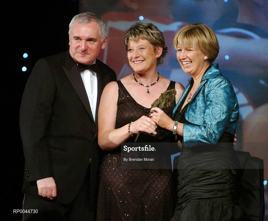 17 November 2007; Mary Quinn, Leitrim, is presented with the Hall of Fame award by An Taoiseach Bertie Ahern T.D. in the company of Geraldine Giles, President, Cumann Peil na mBan, at the 2007 O'Neills/TG4 Ladies Gaelic Football All-Star Awards. Citywest Hotel, Conference, Leisure & Golf Resort, Saggart, Co. Dublin. Picture credit: Brendan Moran / SPORTSFILE  *** Local Caption ***