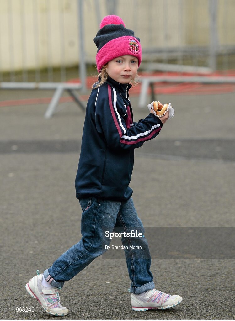 15 February 2015; Deirbhile Mellon, aged 4, from Slaughtneil, Derry, arrives with her hot dog ahead of the game. AIB GAA Football All-Ireland Senior Club Championship, Semi-Final, Austin Stacks v Slaughtneil, O'Moore Park, Portlaoise, Co. Laois. Picture credit: Brendan Moran / SPORTSFILE