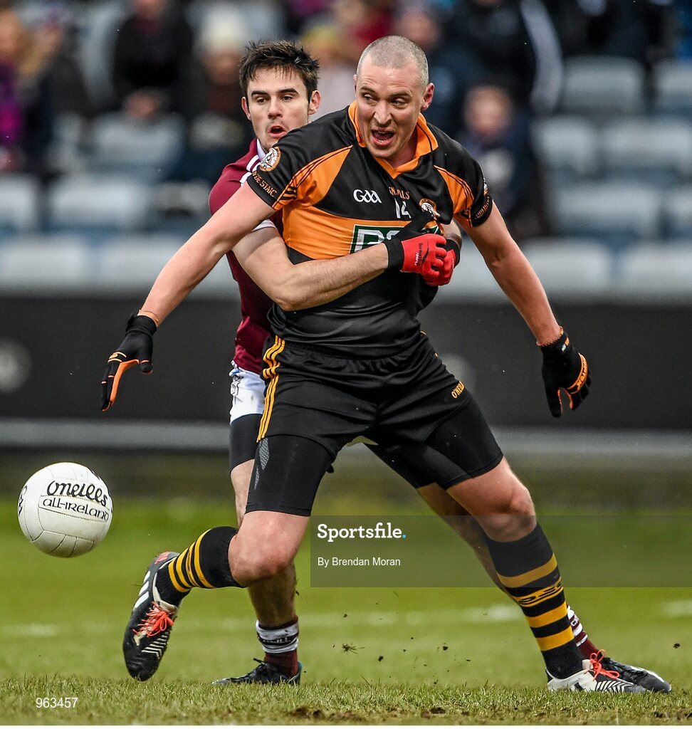 15 February 2015; Kieran Donaghy, Austin Stacks, is tackled by Chrissy McKaigue, Slaughtneil. AIB GAA Football All-Ireland Senior Club Championship, Semi-Final, Austin Stacks v Slaughtneil, O'Moore Park, Portlaoise, Co. Laois. Picture credit: Brendan Moran / SPORTSFILE
