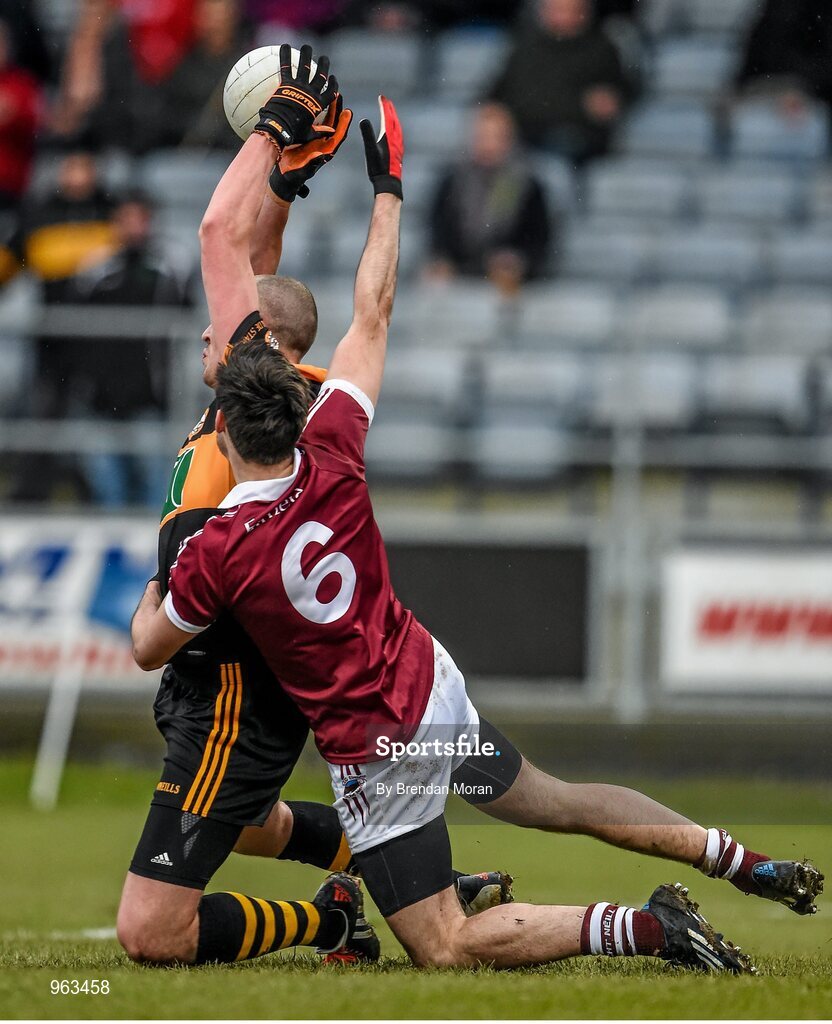 15 February 2015; Kieran Donaghy, Austin Stacks, manages to gain possession of the ball while being fouled by Chrissy McKaigue, Slaughtneil, resulting in a penalty for Austin Stacks. AIB GAA Football All-Ireland Senior Club Championship, Semi-Final, Austin Stacks v Slaughtneil, O'Moore Park, Portlaoise, Co. Laois. Picture credit: Brendan Moran / SPORTSFILE