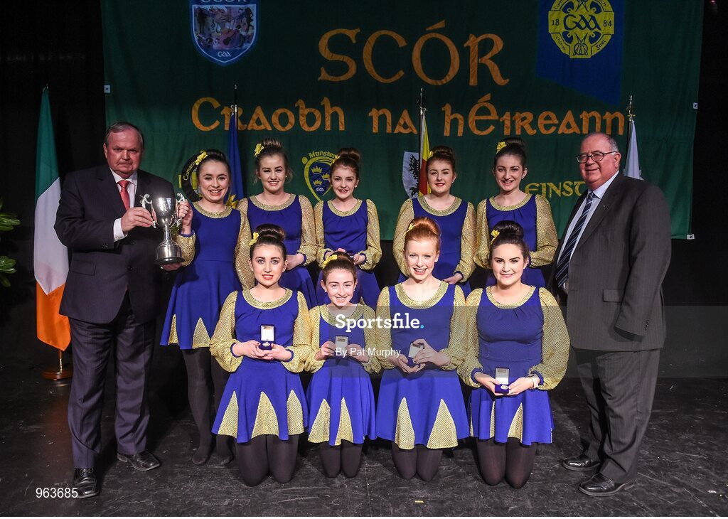 14 February 2015; The Spa, Co. Kerry, team of Aine Ni Bhrosnachain, Caitlin Ni Chroinin, Lamia Switzer, Eabha Ni Shuilleabhain, Sorcha Randal, Leah Ni Mhuimhneachain, Rachel Ni Mhuimhneachain and Megan Ni Chroinin, are presented with their trophy after winning the Figure Dancing competition during the All-Ireland Scór na nÓg Championship Finals 2015. Citywest Hotel, Saggart, Co. Dublin. Picture credit: Pat Murphy / SPORTSFILE