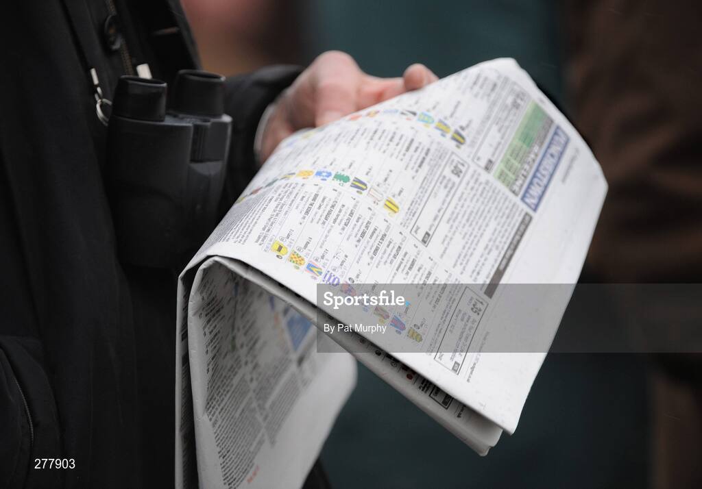 31 December 2007; A race fan checks the form before the Visit The Panoramic Restaurant Beginners Steeplechase. Punchestown Races, Punchestown Racecourse, Co. Kildare. Picture credit; Pat Murphy / SPORTSFILE