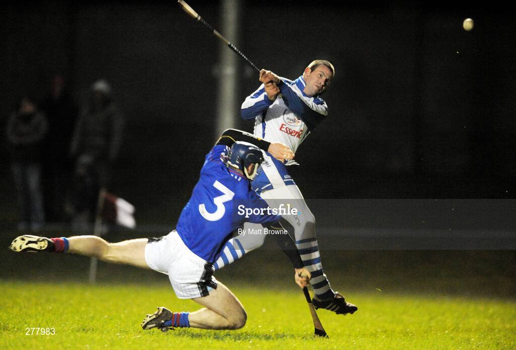 2 January 2008; Dan Shanahan, Waterford, puts over his first point of the year despite the tackle of Kevin Lanigan, Waterford Institute of Technology. Waterford Crystal tournament, Waterford v Waterford Institute of Technology, St Molleran's club, Carrick-On-Suir, Co. Tipperary. Picture credit: Matt Browne / SPORTSFILE