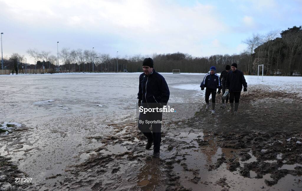 5 January 2008; Spectators make their way through the mucky conditions during the Belfast International Cross Country. Stormont Estate, Belfast, Co. Antrim. Picture credit; Paul Mohan / SPORTSFILE