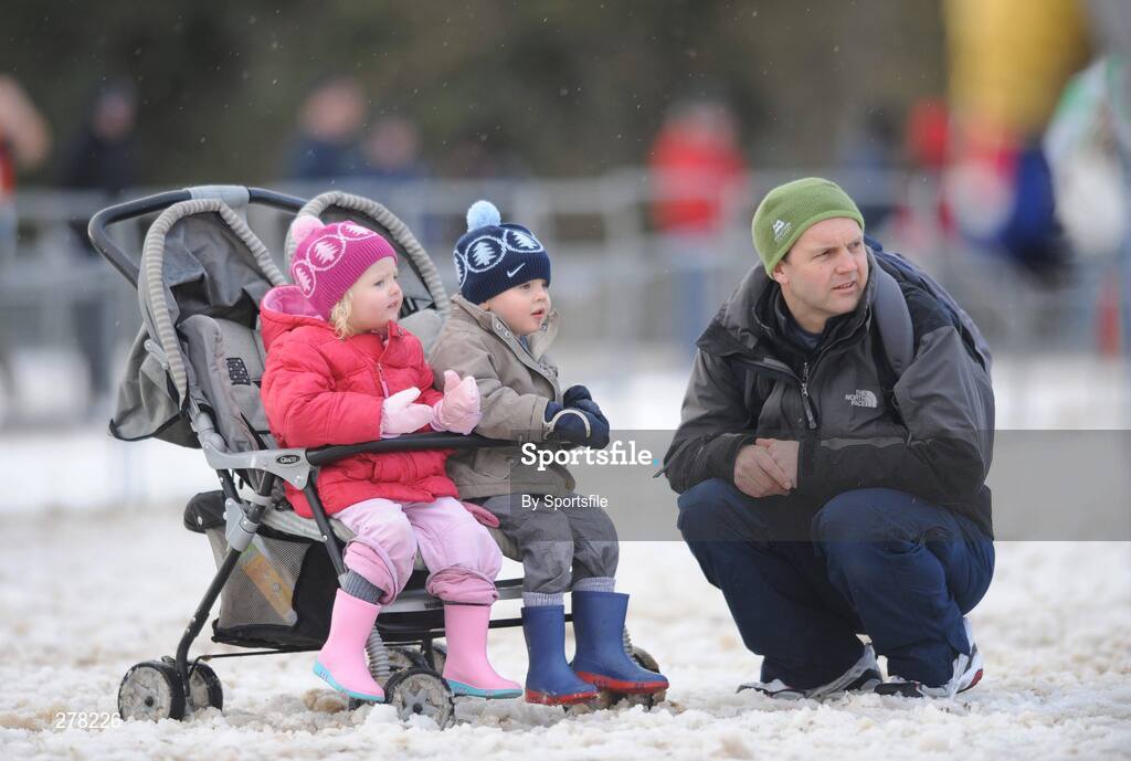 5 January 2008; John Lyster from Belfast, with his three year old twins Helen and Stephen, watch one of the races at the Belfast International Cross Country. Stormont Estate, Belfast, Co. Antrim. Picture credit; Paul Mohan / SPORTSFILE