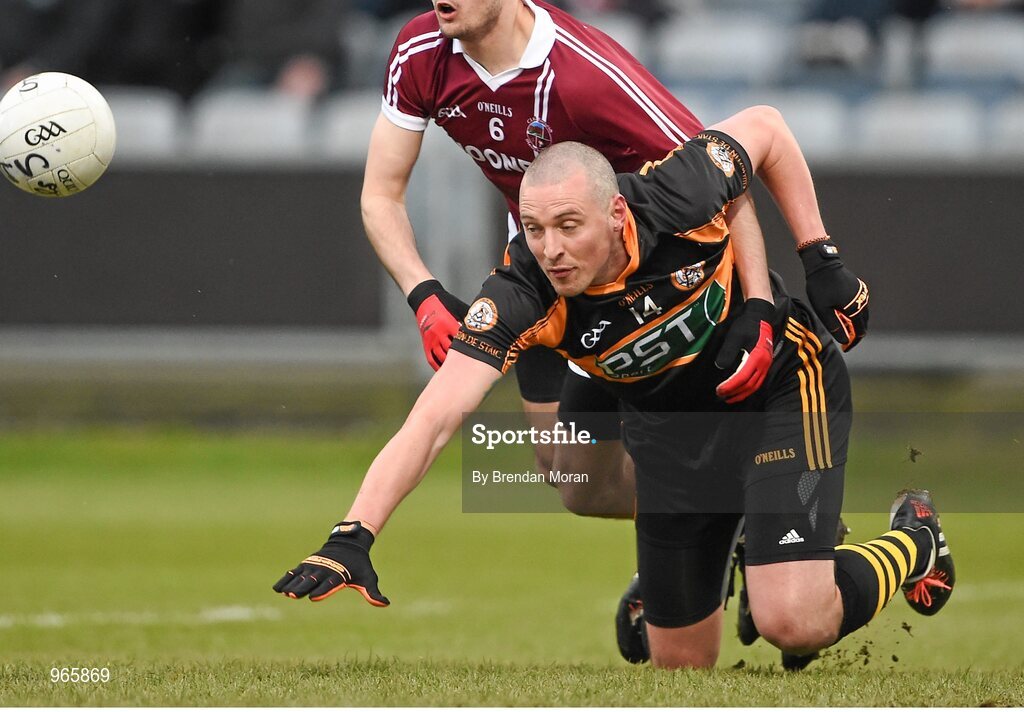 15 February 2015; Kieran Donaghy, Austin Stacks, is tackled by Chrissy McKaigue, Slaughtneil. AIB GAA Football All-Ireland Senior Club Championship, Semi-Final, Austin Stacks v Slaughtneil, O'Moore Park, Portlaoise, Co. Laois. Picture credit: Brendan Moran / SPORTSFILE