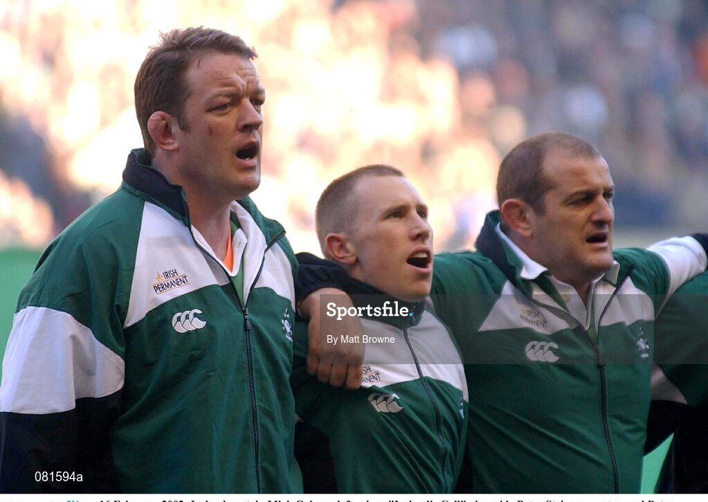 16 February 2002; Ireland captain Mick Galwey, left,  sings "Ireland's Call" alongside Peter Stringer, centre, and Peter Clohessy  England. Lloyds TSB Six Nations Championship,  England v Ireland, Twickenham, England.  Picture credit: Matt Browne / SPORTSFILE