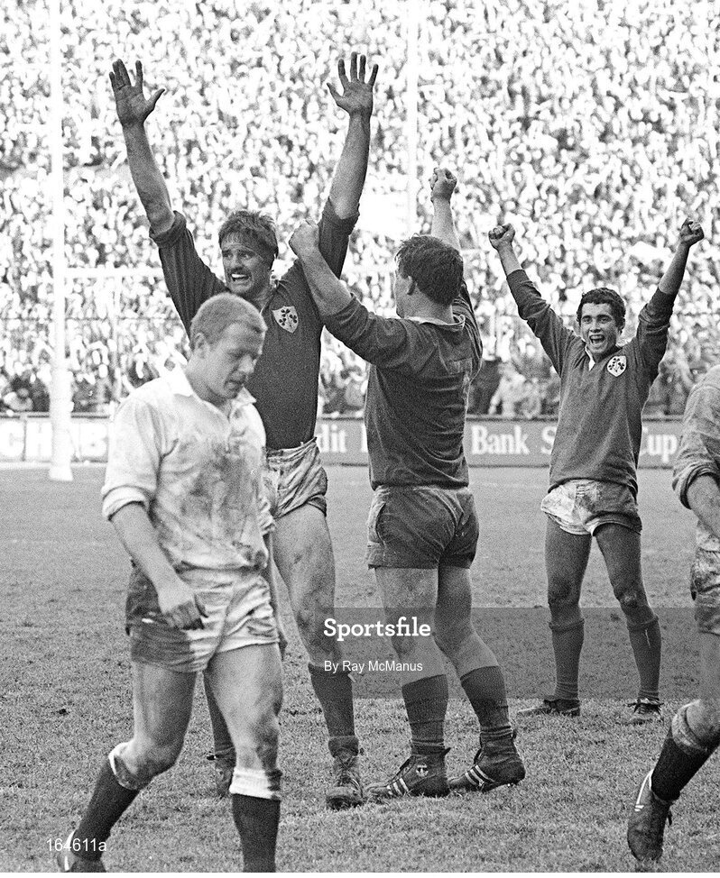 30 March 1985; Ireland players Willie Anderson, left, Jim McCoy and Michael Bradley, right, celebrate winning the Triple Crown at the final whistle. Five Nations Rugby Championship, Ireland v England, Lansdowne Road, Dublin. Picture credit: Ray McManus / SPORTSFILE