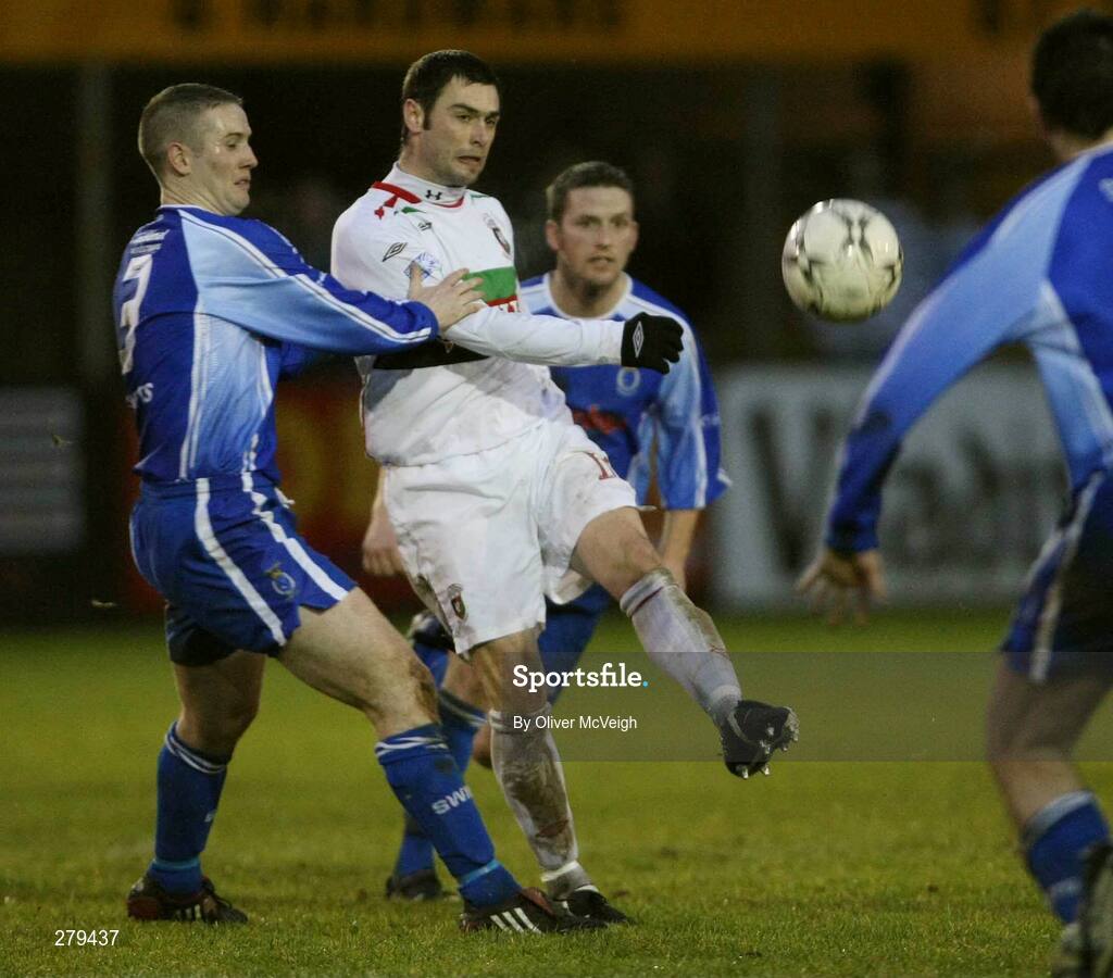 19 January 2008; Gary Hamilton, Glentoran, in action against JP Gallagher, Dungannon Swifts. Carnegie Premier League, Dungannon Swifts v Glentoran, Stangmore Park, Dungannon, Co. Tyrone. Picture credit; Oliver McVeigh / SPORTSFILE