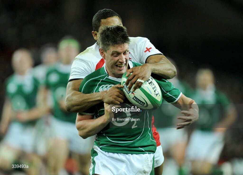 28 February 2009; Ronan O'Gara, Ireland, is tackled by Delon Armitage, England. RBS Six Nations Rugby Championship, Ireland v England, Croke Park, Dublin. Picture credit: Brendan Moran / SPORTSFILE