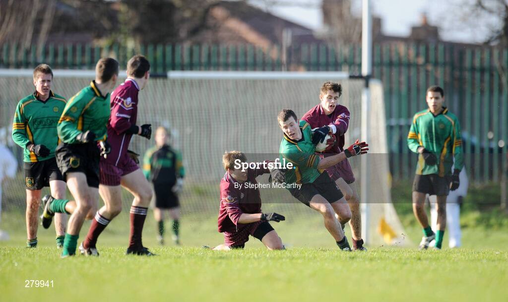 24 January 2008; Kieran Clarke, St Benildus College, in action against David Ryan, left, and Kieran Whyte, Franciscan College. Leinster Colleges Senior Football Championship 'A' Round 2, St Benildus College, green, v Franciscan College Gormanston, marron, Kilmacud, Dublin. Picture credit; Stephen McCarthy / SPORTSFILE