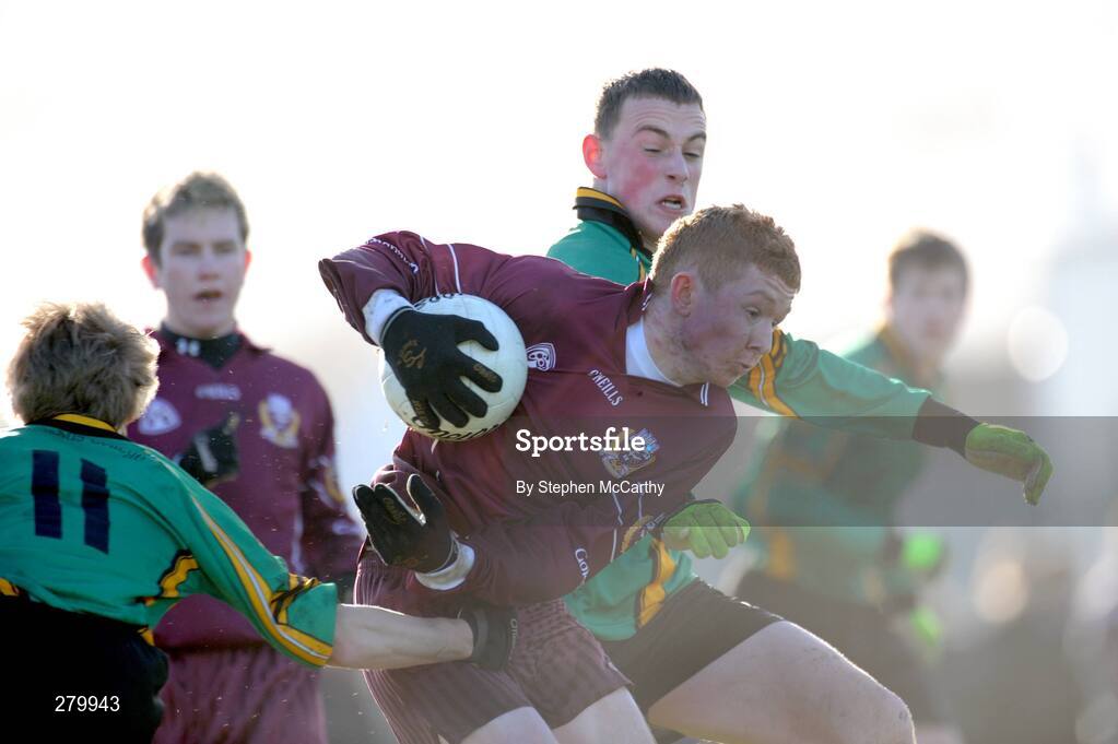 24 January 2008; Tadhg McHugh, Franciscan College, in action against Daniel Kennedy, 11, and Sean O'Connor, College. Leinster Colleges Senior Football Championship 'A' Round 2, St Benildus College, green, v Franciscan College Gormanston, marron, Kilmacud, Dublin. Picture credit; Stephen McCarthy / SPORTSFILE *** Local Caption ***