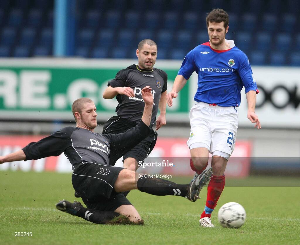 26 January 2008; Thomas Stewart, Linfield, in action against Iain Latimer, Armagh City. Carnegie Premier League, Linfield v Armagh City, Windsor Park, Belfast, Co Antrim. Picture credit; Oliver McVeigh / SPORTSFILE