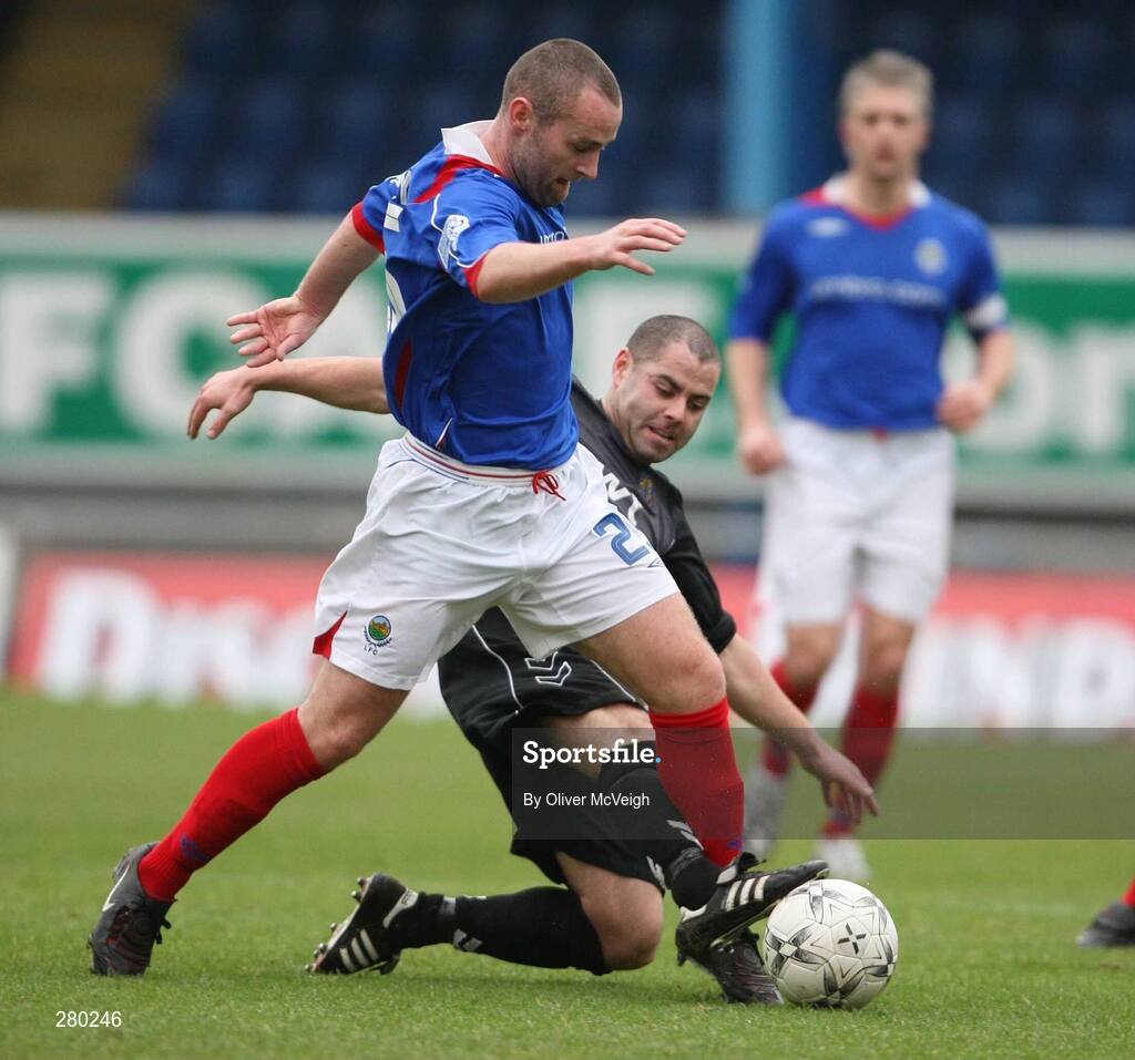 26 January 2008; Conor Downey, Linfield, in action against James Slater, Armagh City. Carnegie Premier League, Linfield v Armagh City, Windsor Park, Belfast, Co Antrim. Picture credit; Oliver McVeigh / SPORTSFILE
