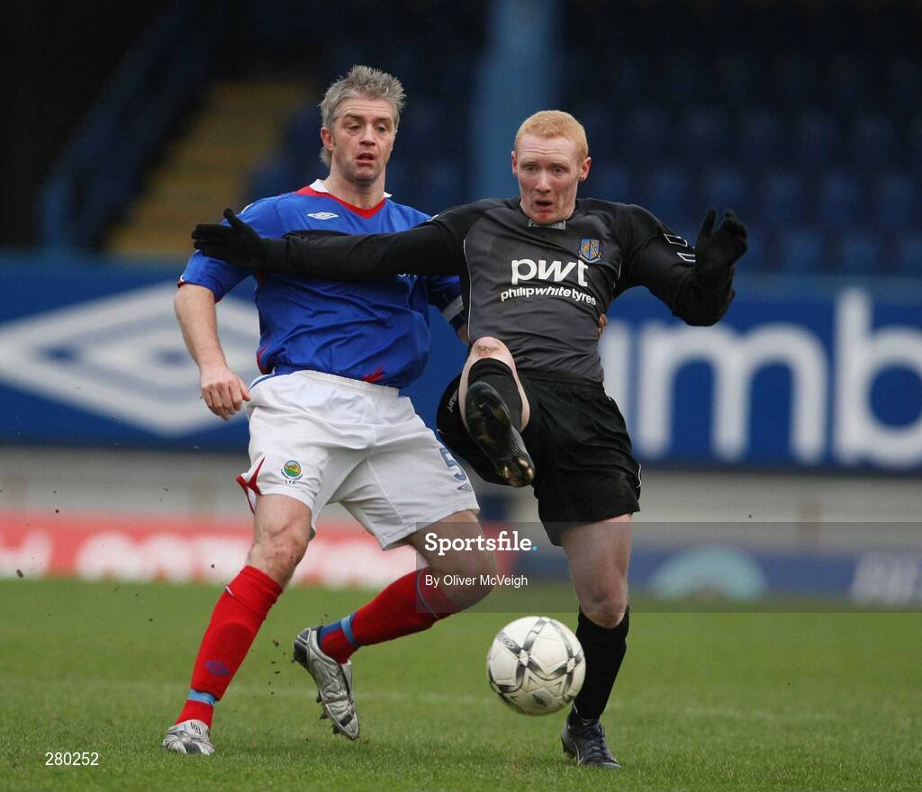 26 January 2008; Cian Mackey, Armagh City, in action against William Murphy, Linfield. Carnegie Premier League, Linfield v Armagh City, Windsor Park, Belfast, Co Antrim. Picture credit; Oliver McVeigh / SPORTSFILE