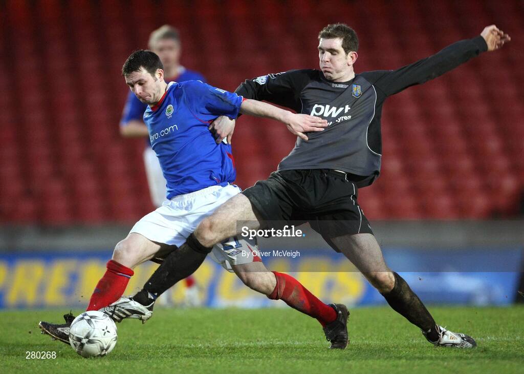 26 January 2008; Jim Ervin, Linfield, in action against Austin McCann, Armagh City. Carnegie Premier League, Linfield v Armagh City, Windsor Park, Belfast, Co Antrim. Picture credit; Oliver McVeigh / SPORTSFILE